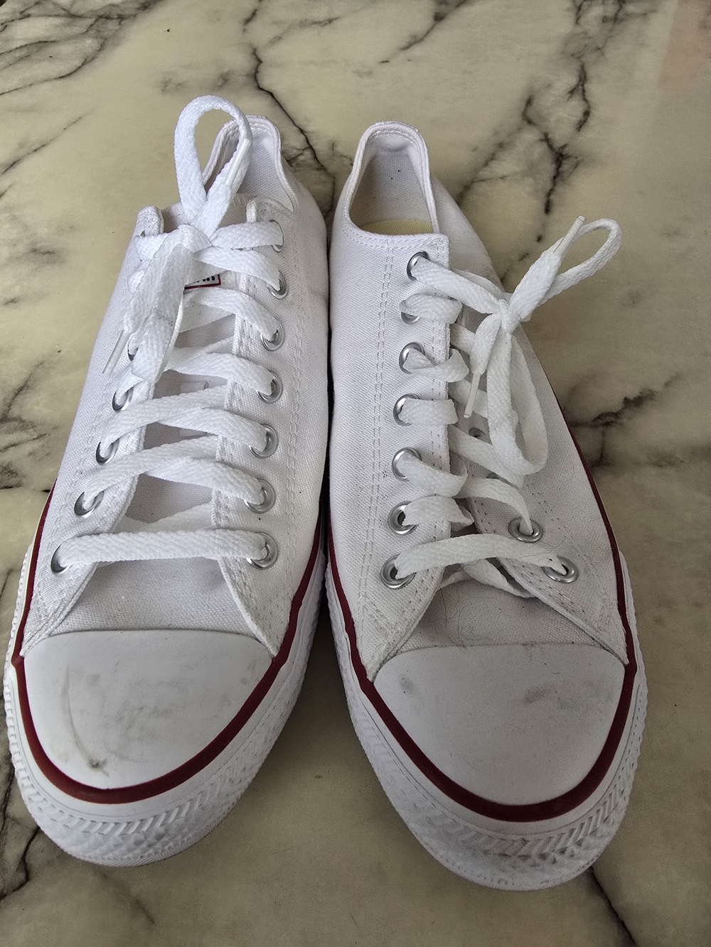 Converse White Canvas Low Top Sneakers with Navy Accents